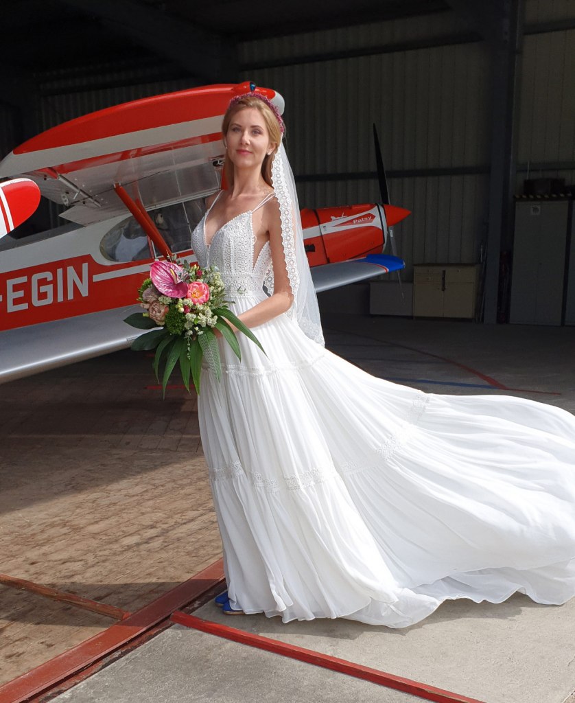 Ein Vintage Brautkleid mit traumhafter Schleppe.